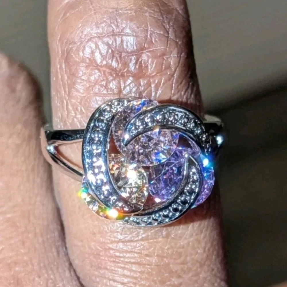 Sparkling Zirconia With Pink,yellow, and Purple Rotating Gemstone Design Sz 8